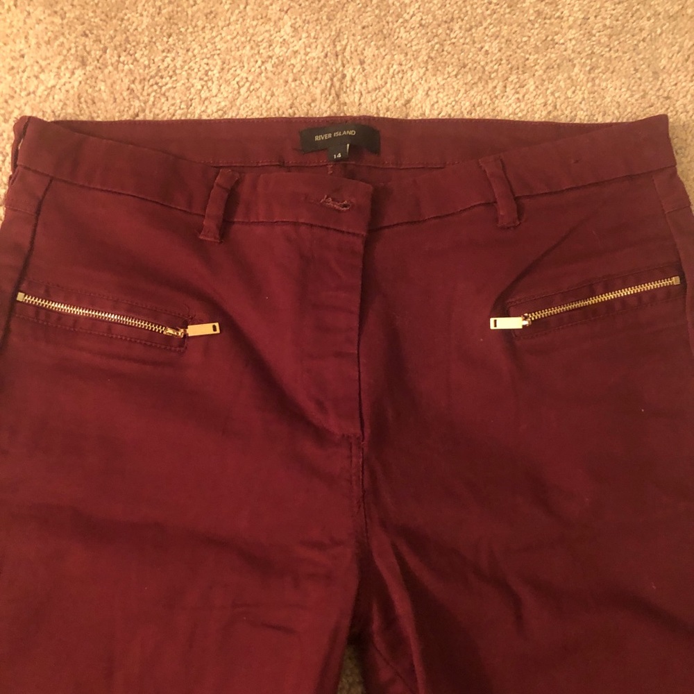 Maroon skinny jeans bought in London